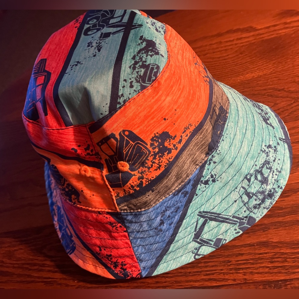 “Trucks” Themed print REVERSES to all navy blue bucket hat by UV Skinz, UPF 50+